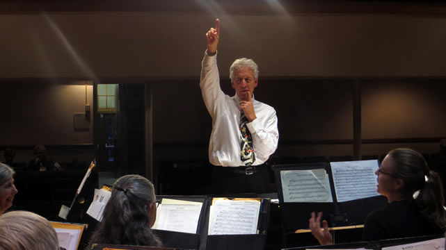 Keith pointing upward at the front of the band